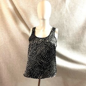 To the Max Black and white silky leopard print sleeveless top.